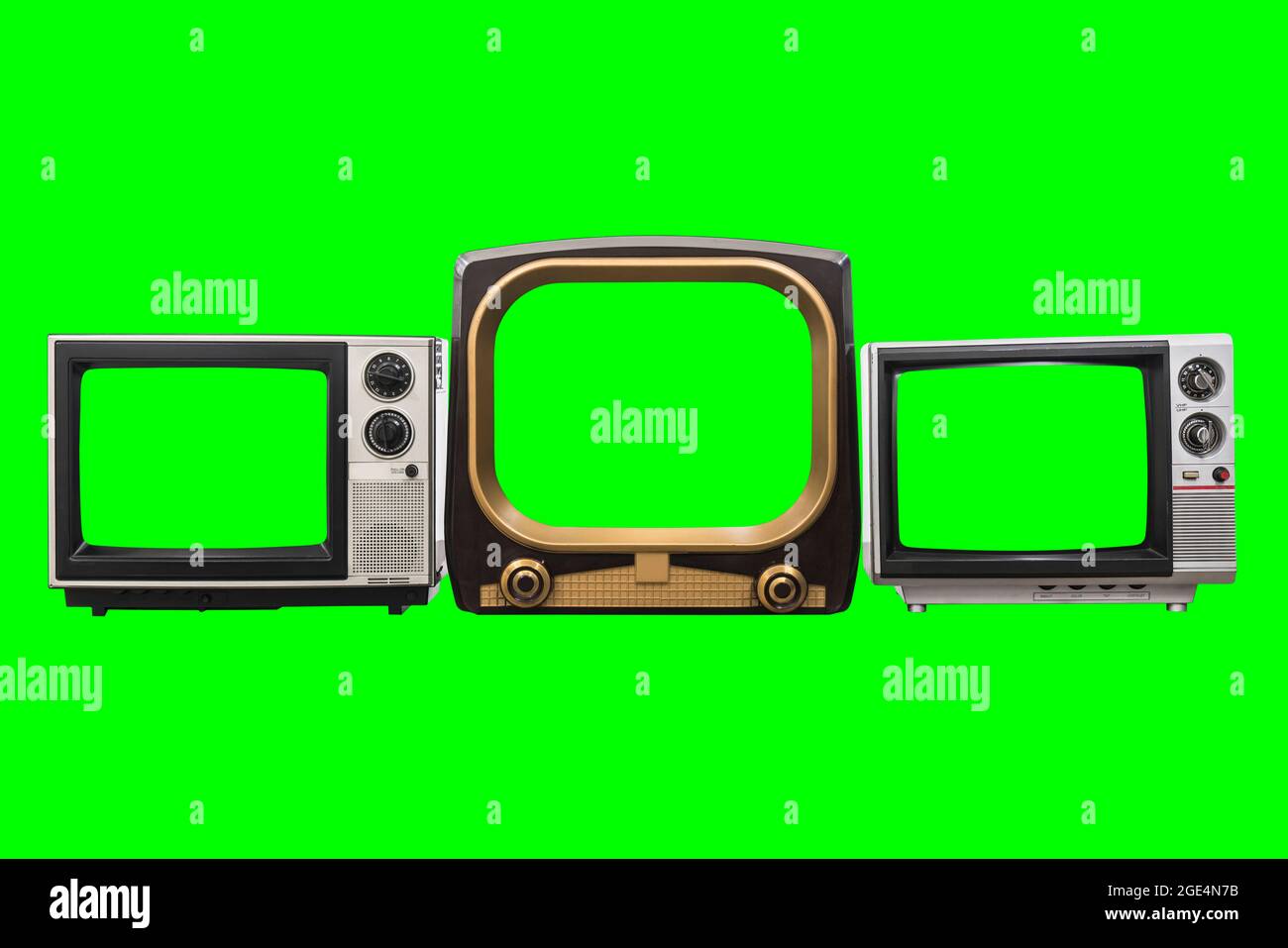 Three old vintage televisions isolated with chroma key green screens and background. Stock Photo