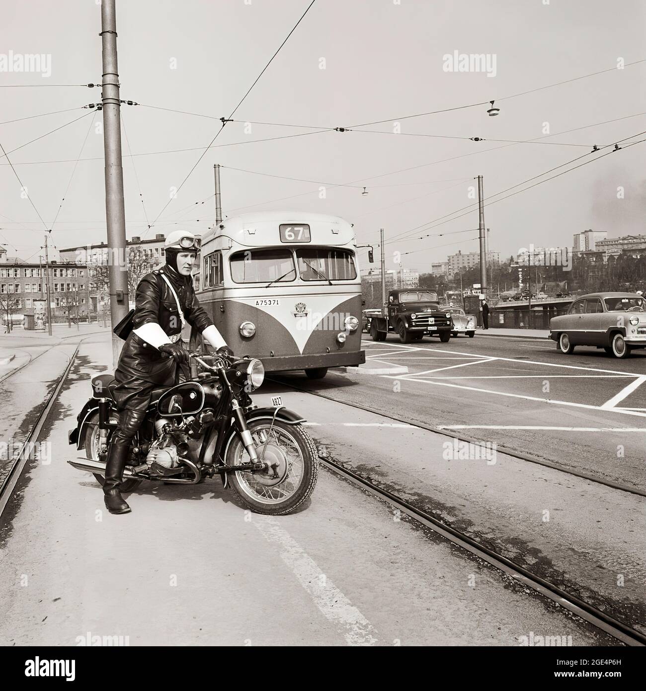 police-on-motorcycle-monitor-traffic-in-stockholm, sweden-1959 Stock Photo