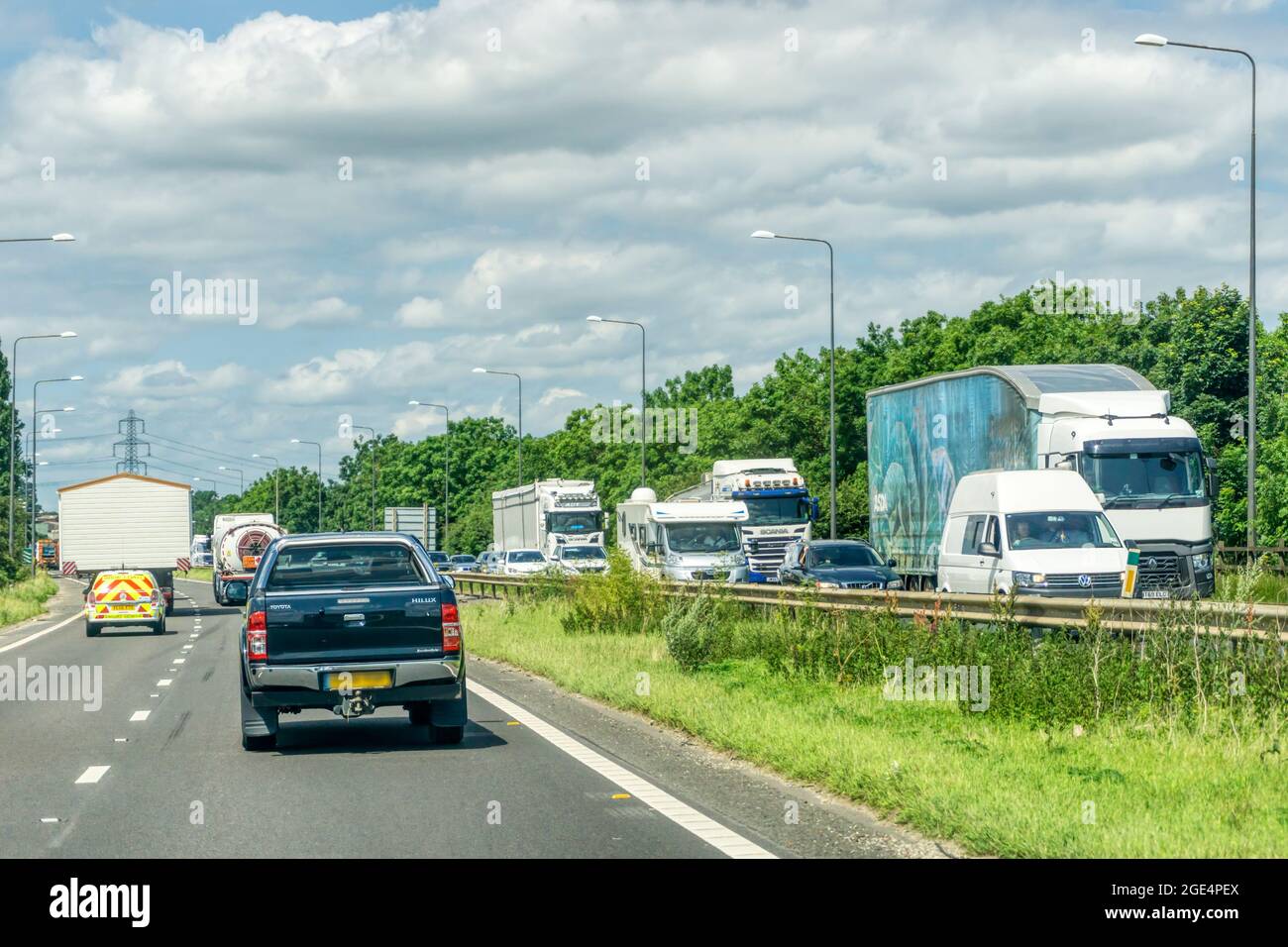 Commercial freight traffic on the dual carriageway A1 road.  View is to the north. Stock Photo