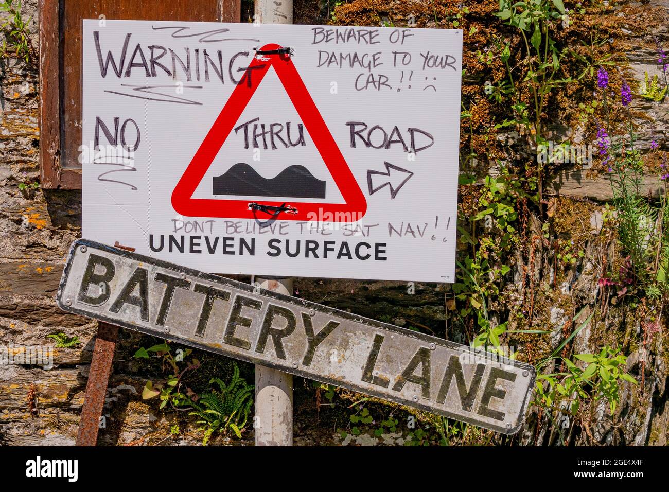 Warning sign to motorists, pictured on Battery Lane, Polruan, Cornwall, UK. Stock Photo