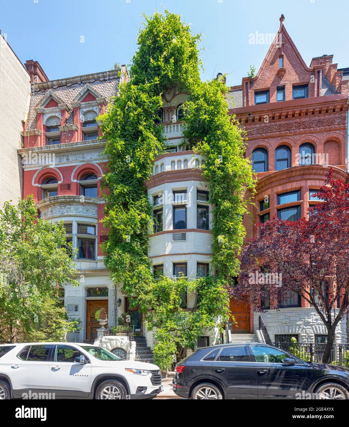 141 and 143 West 81st Street (r), Rossiter & Wright, architects. Mixed Romanesque Revival and Queen Anne styles; 145 (l), William Baker, architect. Stock Photo