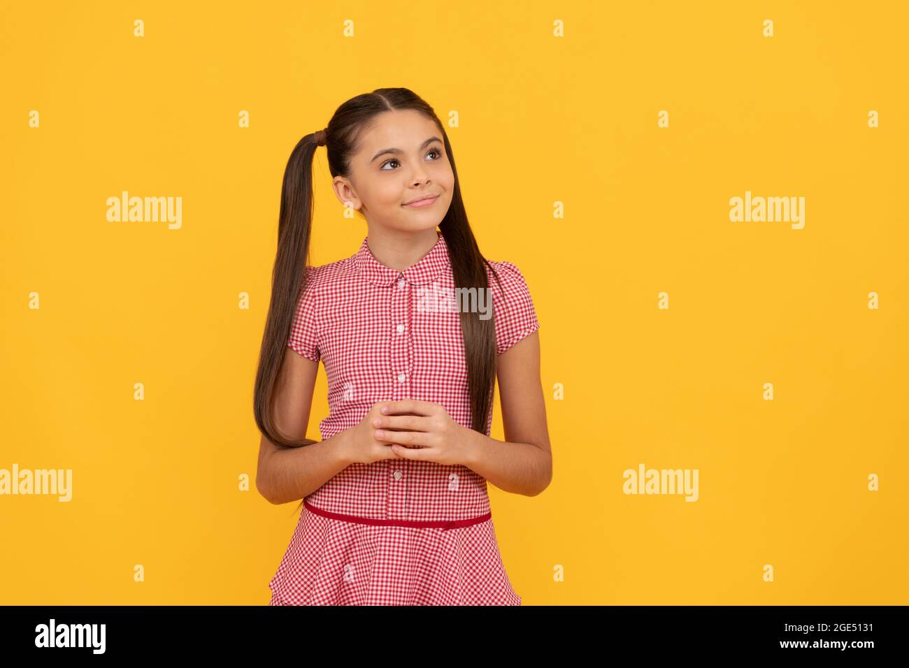 Dare to dream. Dreamful girl yellow background. Child dreamer. Childhood dream Stock Photo