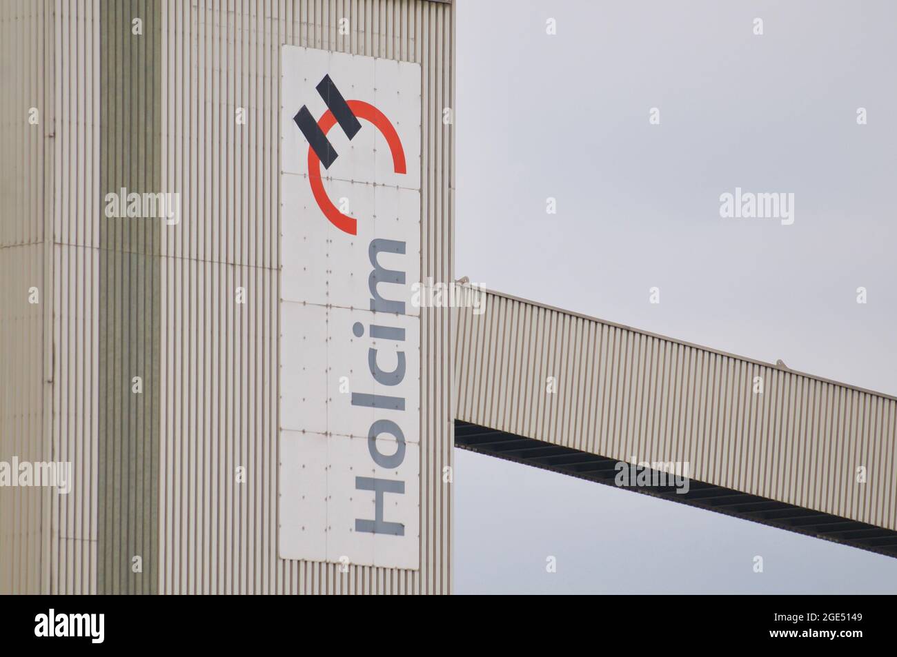 Siggenthal, Aargau, Switzerland - 18th April 2021 : Holcim company sign hanging in front of a building in Switzerlad. Holcim is a Swiss-based global b Stock Photo