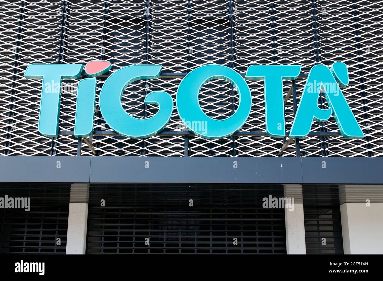 Bioggio, Ticino, Switzerland - 25th April 2021 : Tigotà sign hanging in front of a building in Switzerland. Tigotà is the leading Italian cosmetics, h Stock Photo