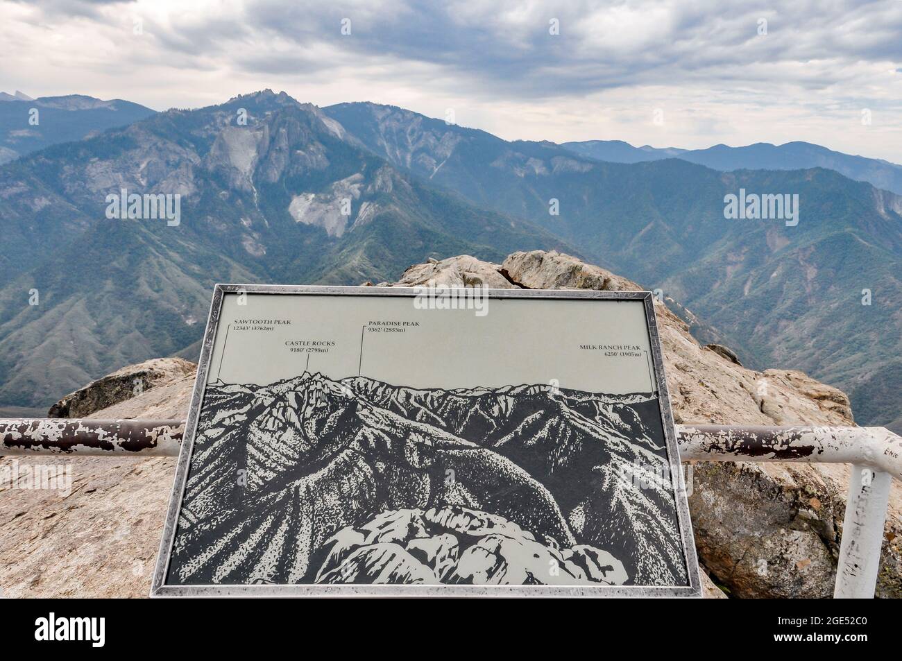 Informational sign at the top end of the Moro Rock trail pointing out Sawtooth Peak, Castle Rocks, Paradise Peak, and Milk Ranch Peak for hikers. Stock Photo
