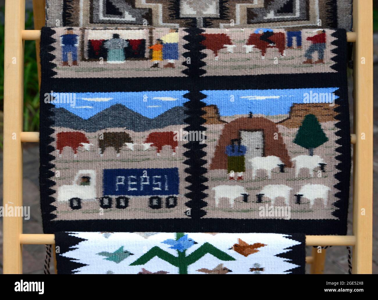 A close up of a handmade NativeAmerican wool rug made by a Navajo weaver for sale in Santa Fe