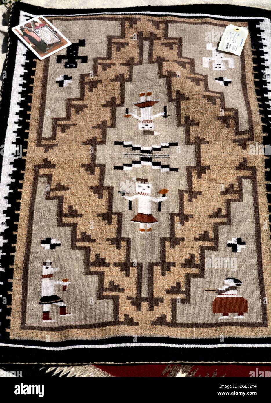 A close up of a handmade NativeAmerican wool rug made by a Navajo weaver for sale in Santa Fe