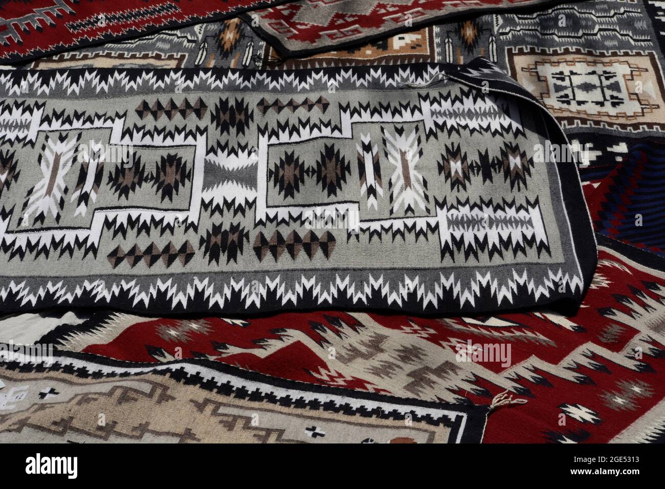 A selection of handmade and hand woven wool rugs made by Navajo