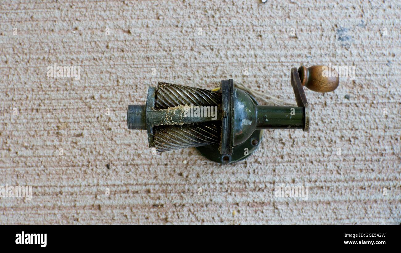 Pencil sharpener mechanism outlet