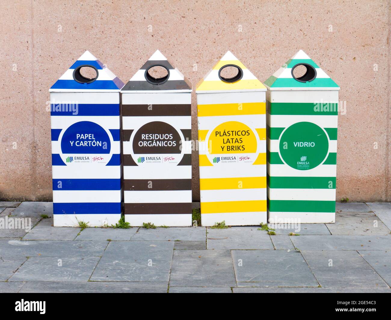 GIJON, SPAIN - April 01, 2018:  Separate paper, plastic, glass and organic garbage collection bins in the form of beach cabins in the Atlantico botani Stock Photo