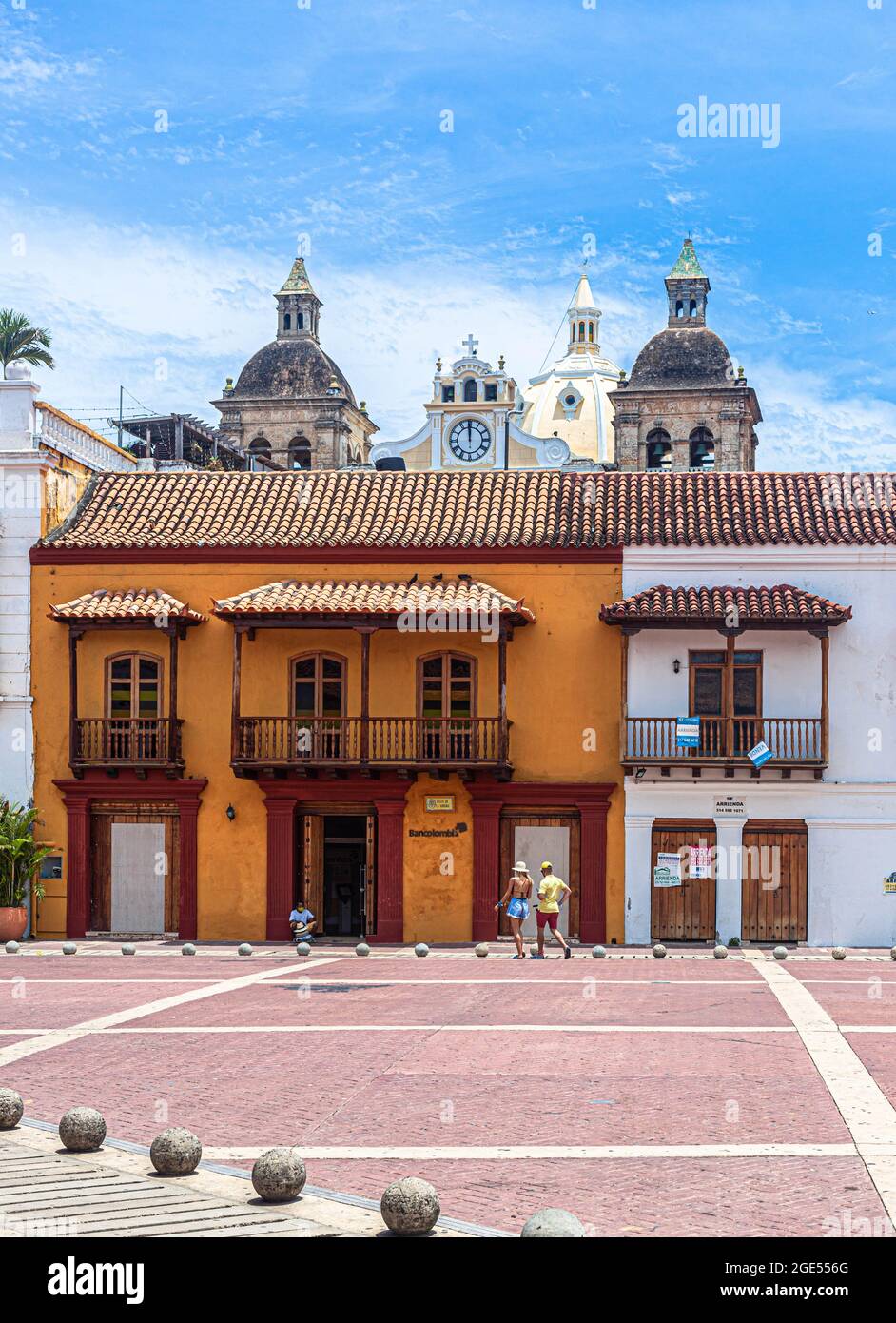 Spanish colonial buildings around Plaza de la Aduana, Cartagena de Indias, Colombia. Stock Photo