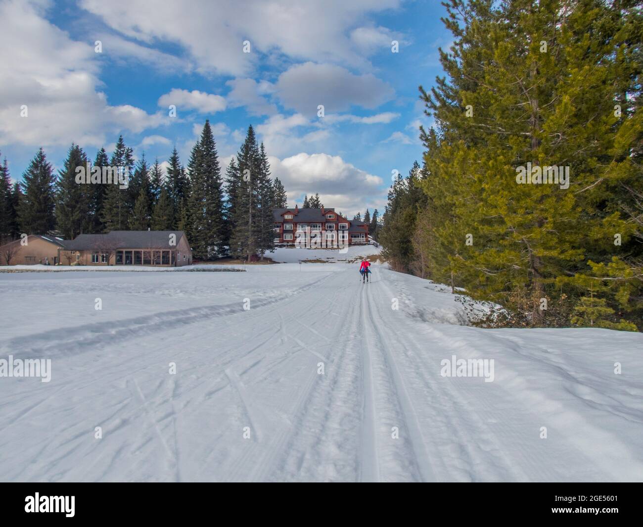 A woman (model released) is crosscountry skiing in the spring at