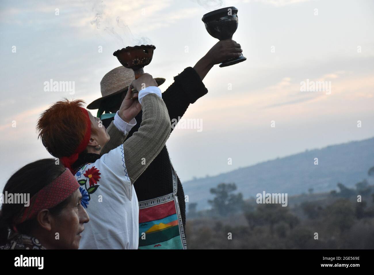 An indigenous ritual performed at dawn on the winter solstice. Here, a ceremony to the four cardinal points is performed. Stock Photo