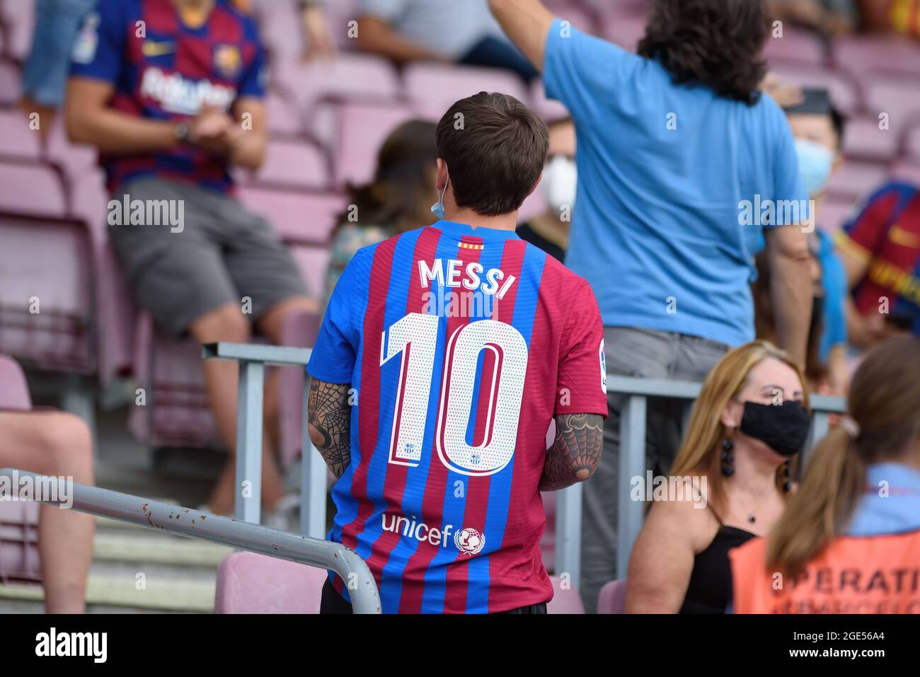 BARCELONA - AUG 15: A fan wearing a Leo Messi shirt at the La Liga match  between