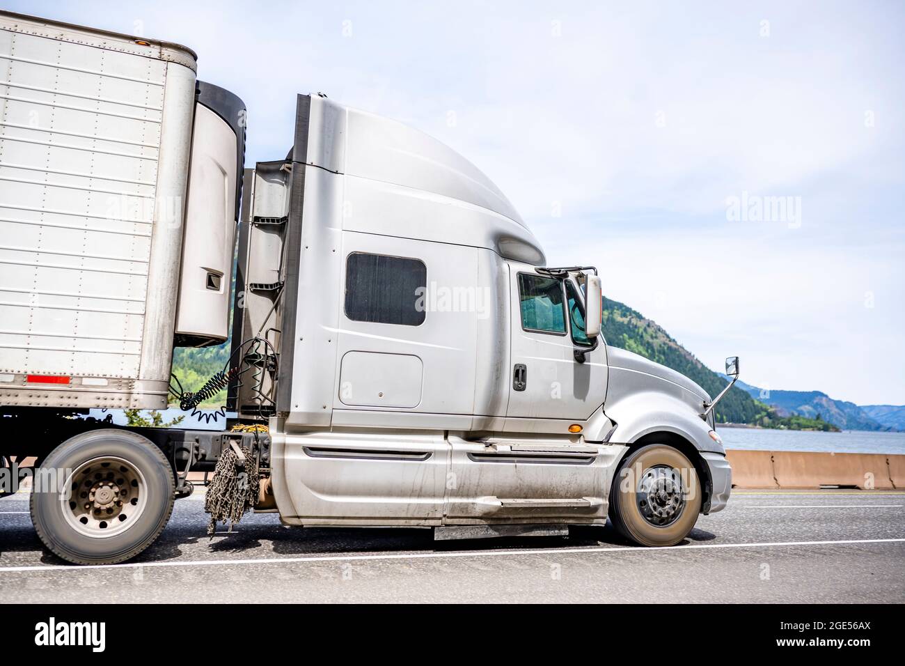Industrial long hauler big rig white semi truck tractor carrier