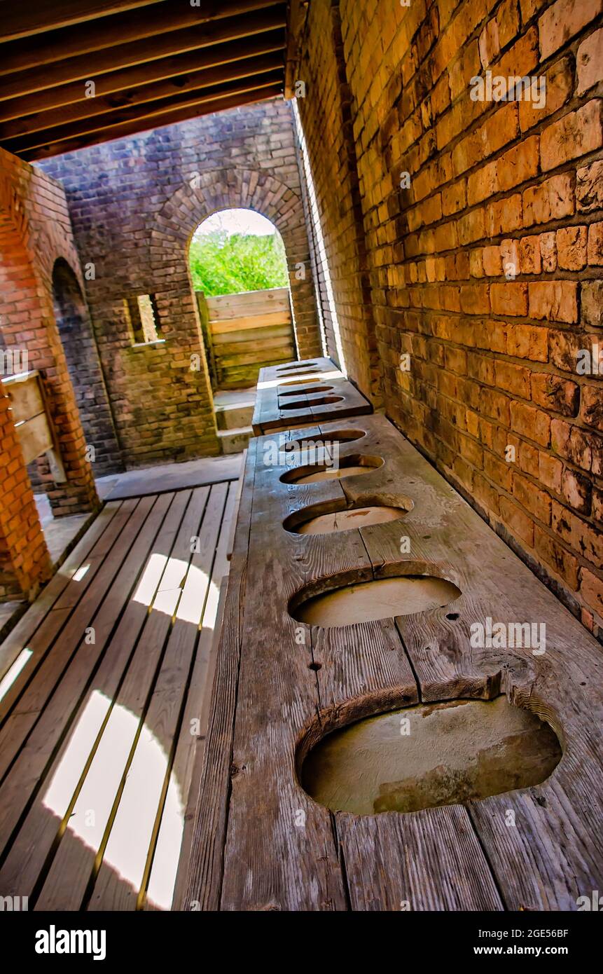 A 10-seat, “self-flushing” latrine served 400 men in the garrison at Fort Gaines, Aug. 12, 2021, in Dauphin Island, Alabama. Stock Photo