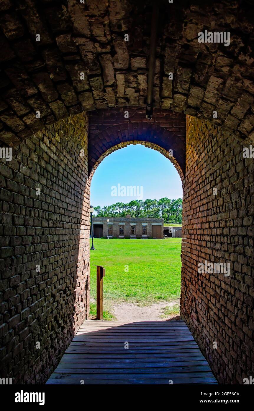 A tunnel leads from the latrine to the courtyard at Fort Gaines, Aug. 12, 2021, in Dauphin Island, Alabama. Stock Photo