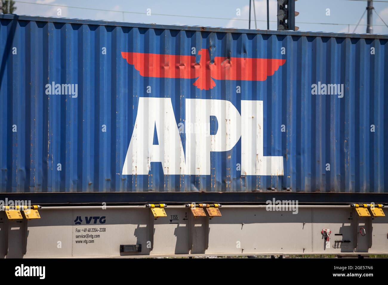 Picture of a sign with the logo of APL Containers on a container being shipped by rail in Ljubljana, Slovenia. APL, formerly called American President Stock Photo