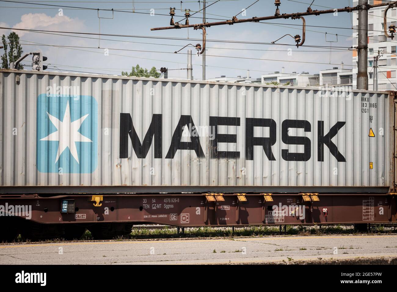 Picture of a sign with the logo of Maersk on a container being shipped by rail in Ljubljana, Slovenia. Maersk, is a Danish integrated shipping company Stock Photo