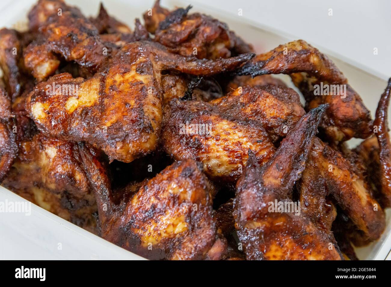 Roasted sticky and crispy chinese chicken wings Stock Photo