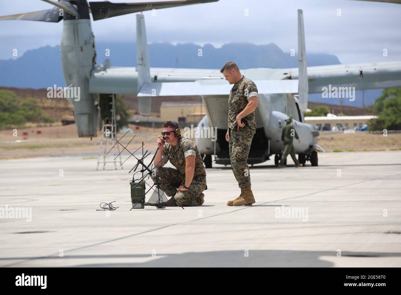 Cpl. Brooks Woodhill, a transmissions systems operator, and Staff Sgt. Thomas King, a