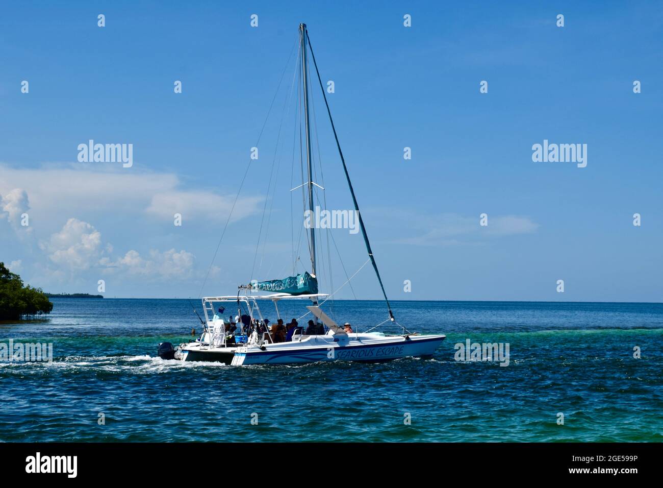 Tourists going for a ride on a boat from the split in Caye Caulker