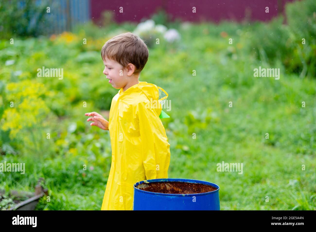 Child in wet clothes hires stock photography and images Alamy