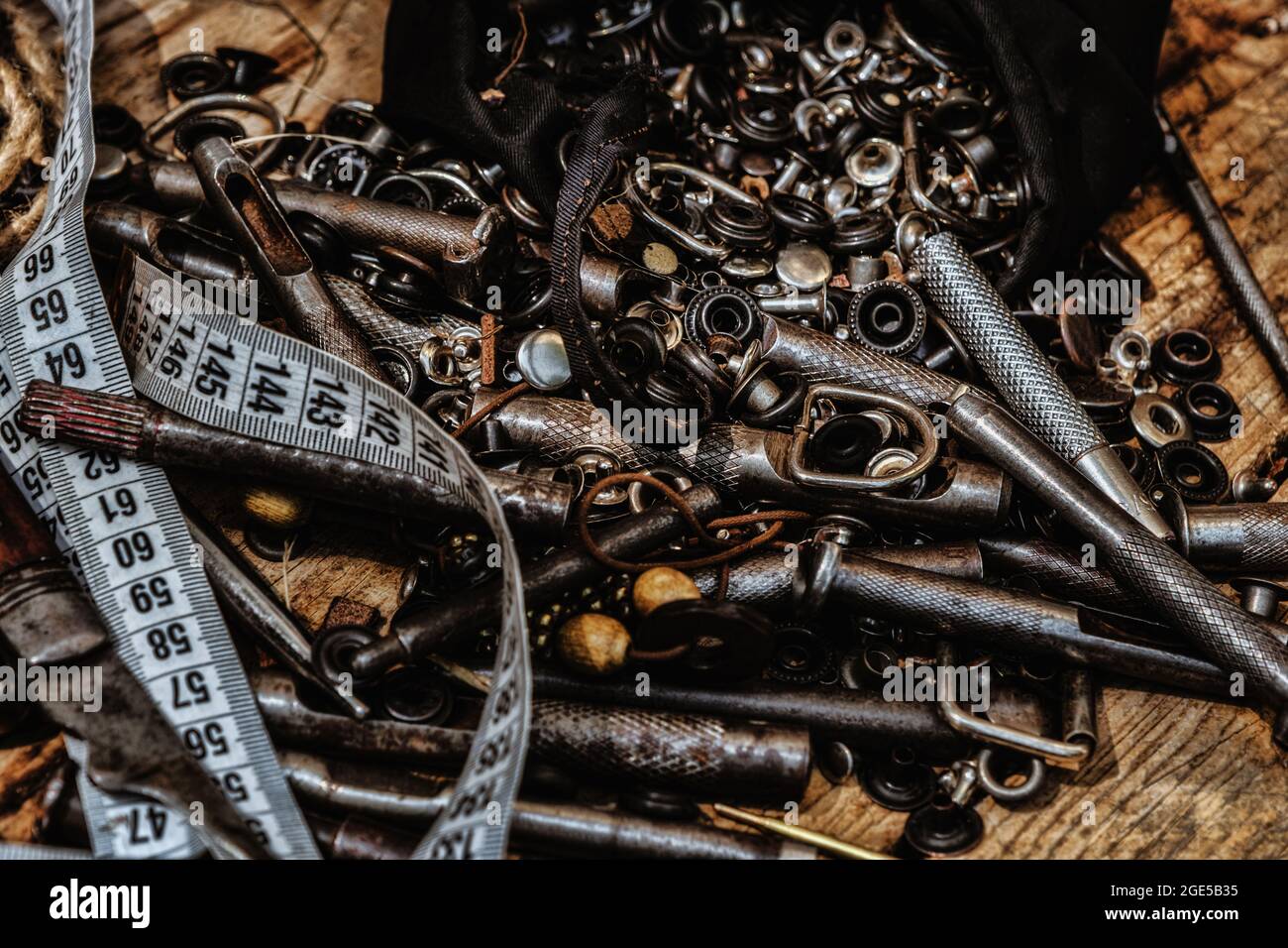 old tools and utensils for leather processing Stock Photo - Alamy