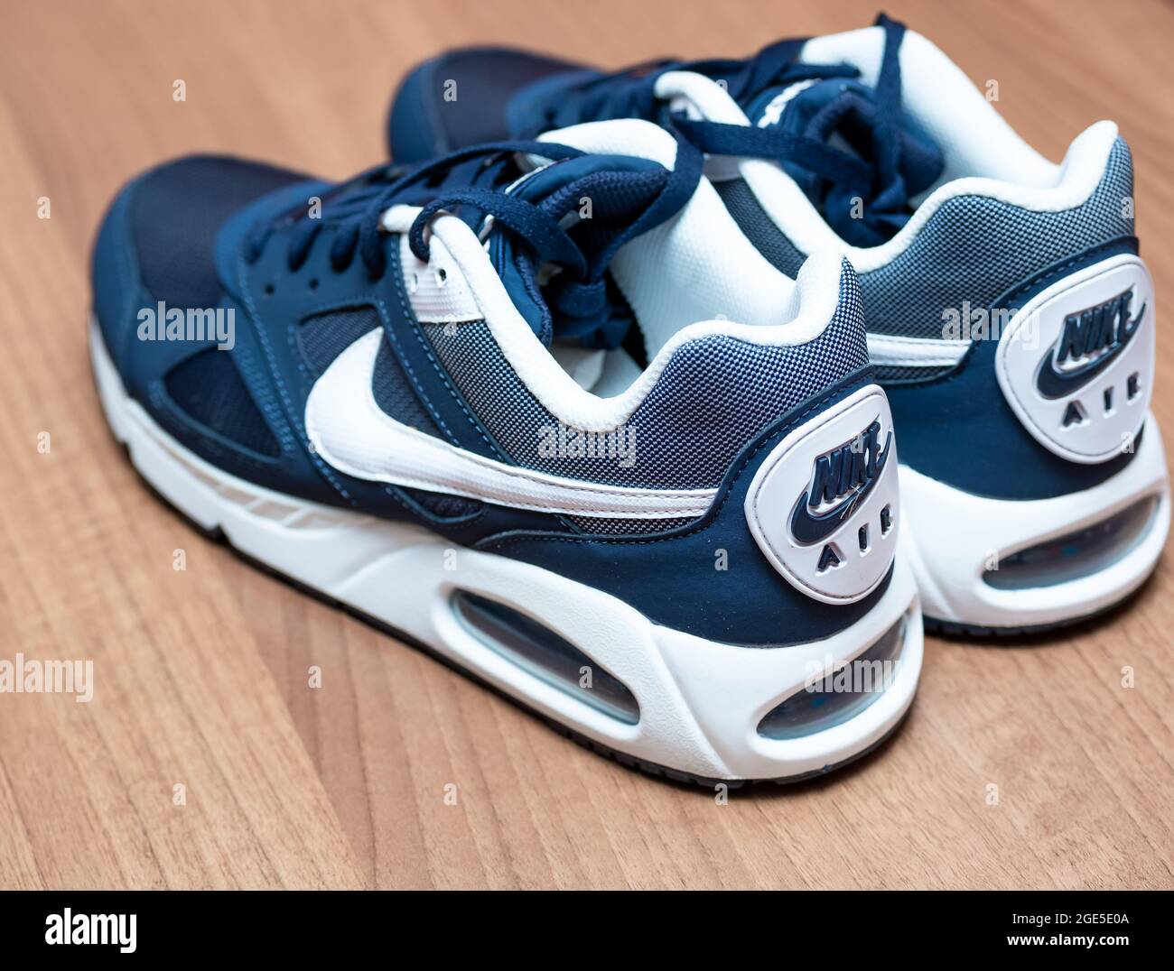 Norwich, Norfolk, UK – August 16 2021. Close and selective focus on navy blue Nike Air Max trainers or sneakers for men Stock Photo