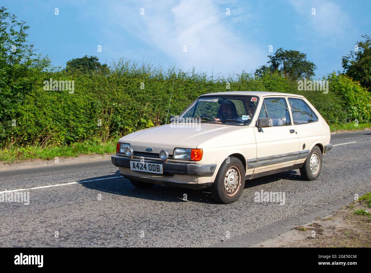 1984 80s beige Ford Fiesta L, 4 speed manual 1117 cc, petrol 2dr en-route to Capesthorne Hall classic July car show, Cheshire, UK Stock Photo