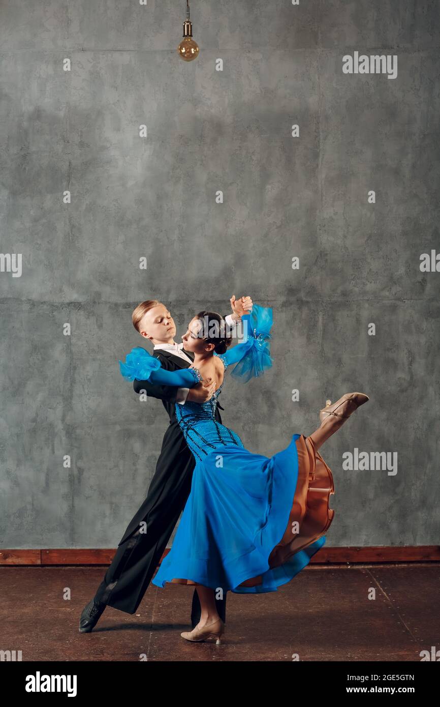Foxtrot Ballroom dance. Young couple dancing in studio Stock Photo Alamy