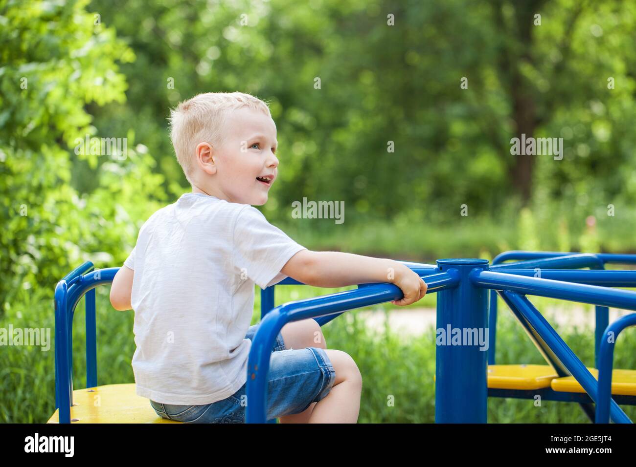 Close-up portrait of a little boy in a summer park Stock Photo - Alamy