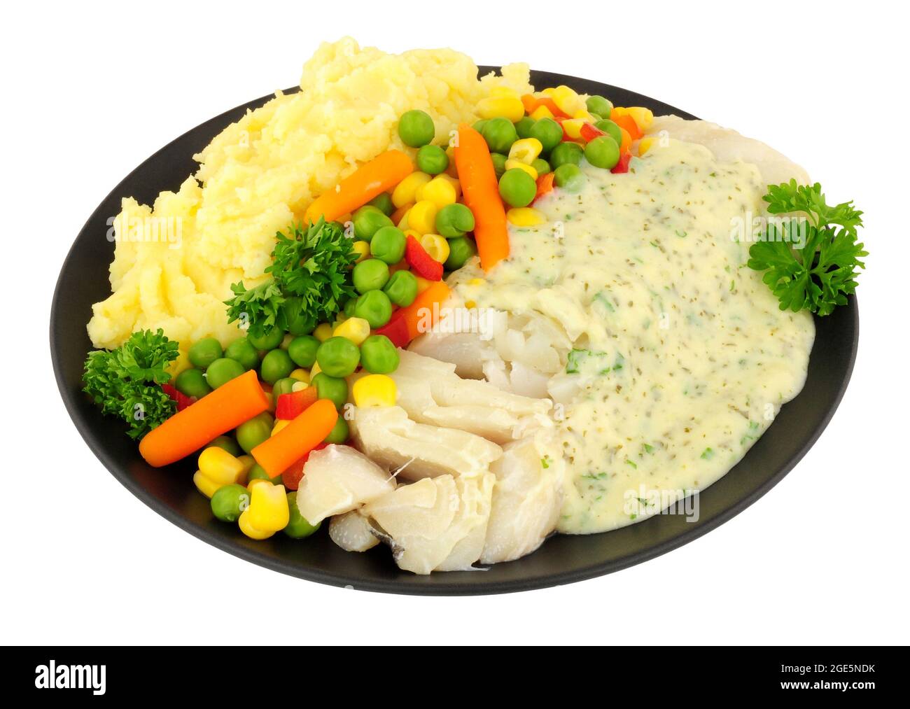 Cod with parsley sauce and mashed potato meal isolated on a white