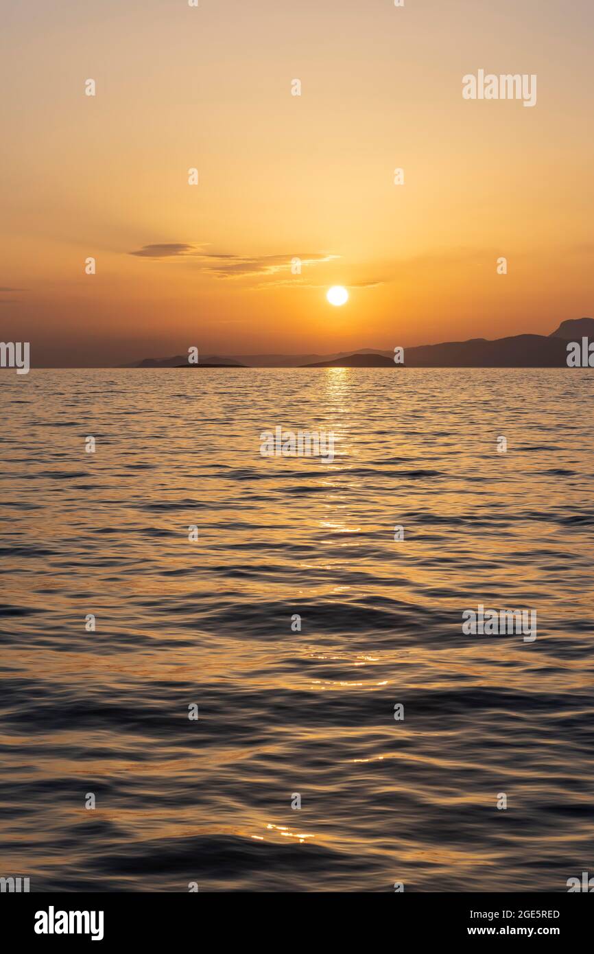 Sunset over the sea, Dodecanese, Greece Stock Photo