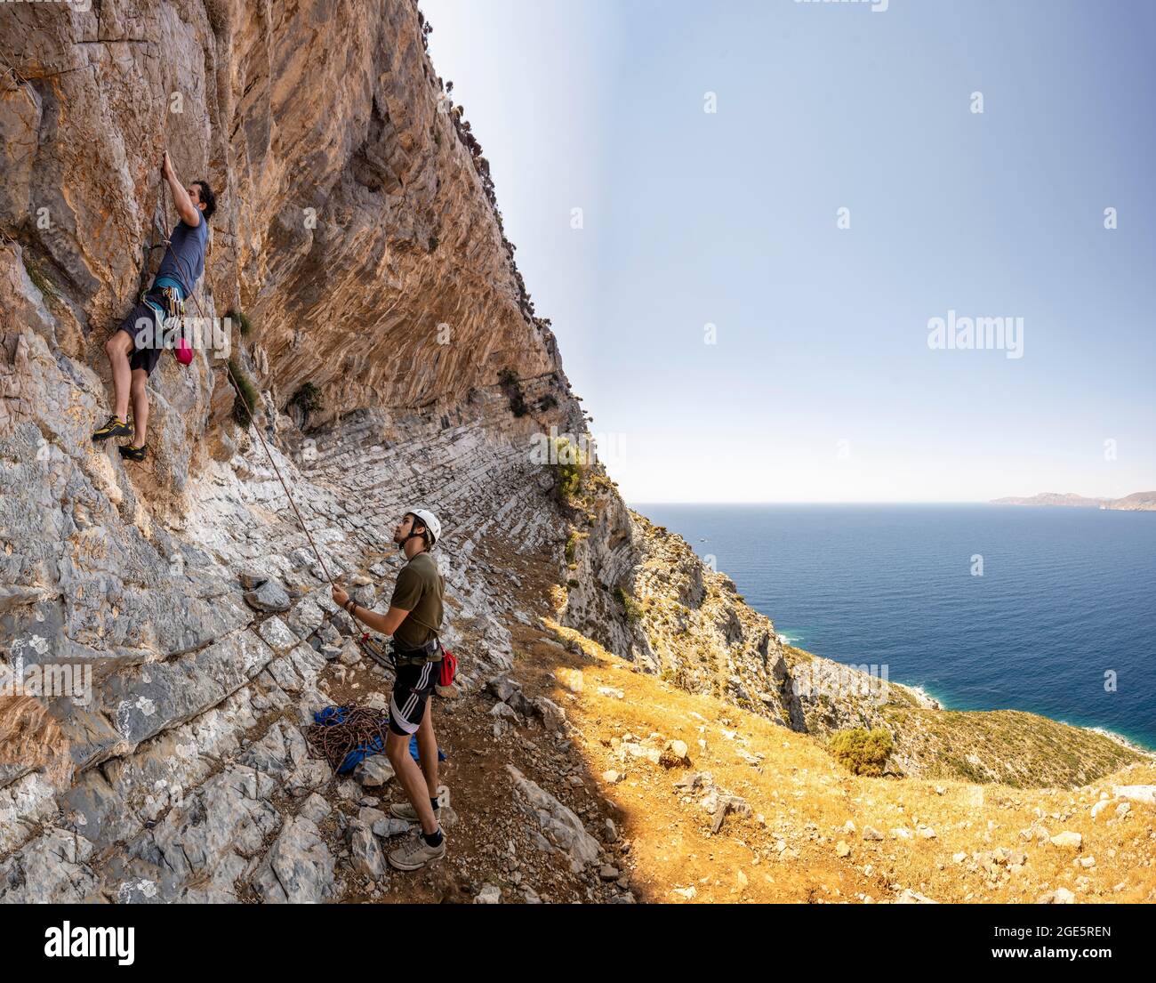 Climbing a rock face, belaying, lead climbing, sport climbing, Kalymnos, Dodecanese, Greece