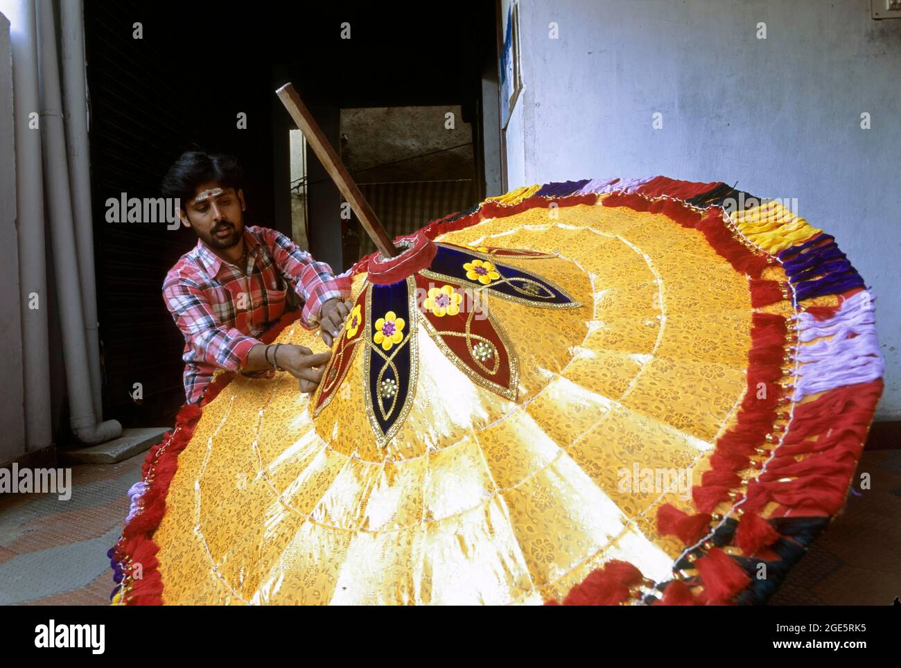Making temple umbrellas in Chindadripet, Chennai; Madras, Tamil Nadu