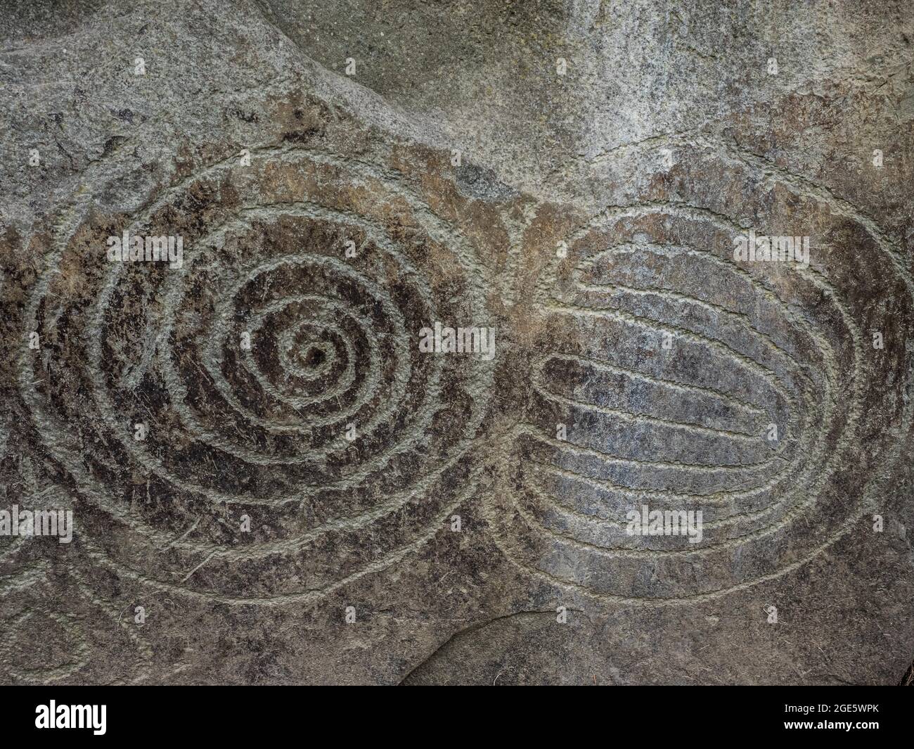 Rock engraving on Neolithic passage grave, Knowth,Unesco world heritage sight, prehstoric Bru na Boinne, Ireland Stock Photo