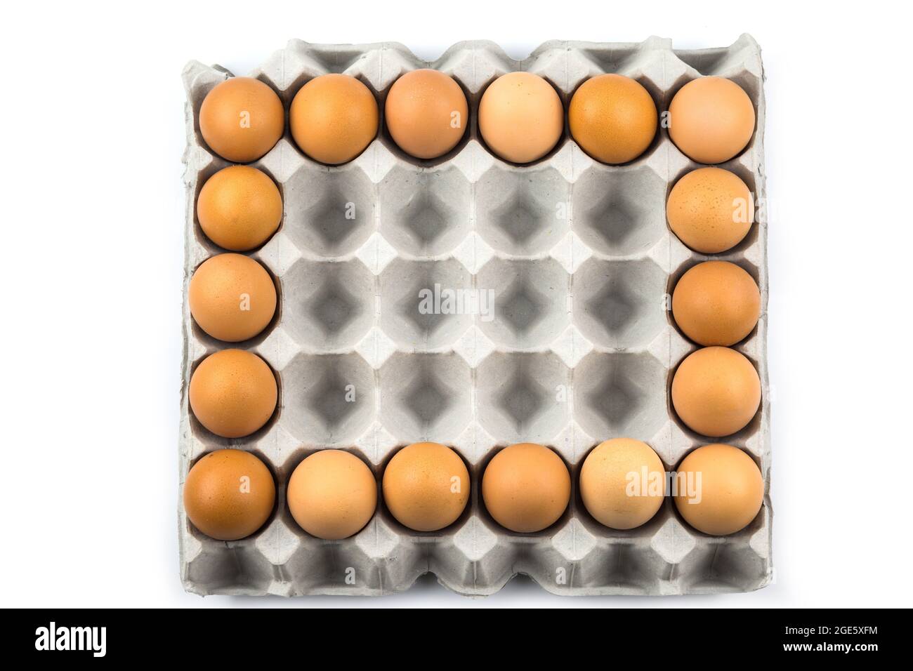 Eggs arranged in a number isolated on white background Stock Photo
