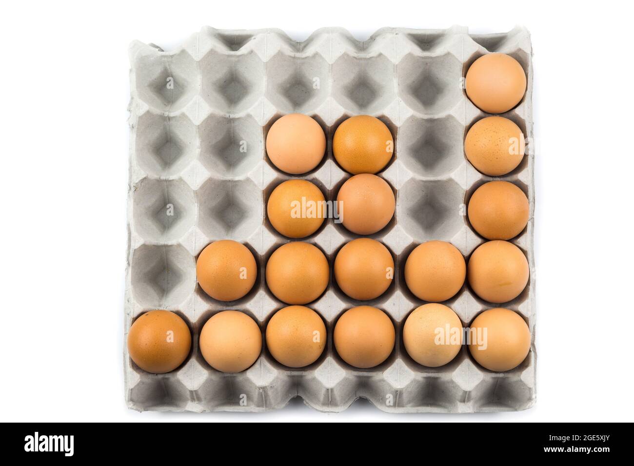 Eggs arranged in a number isolated on white background Stock Photo