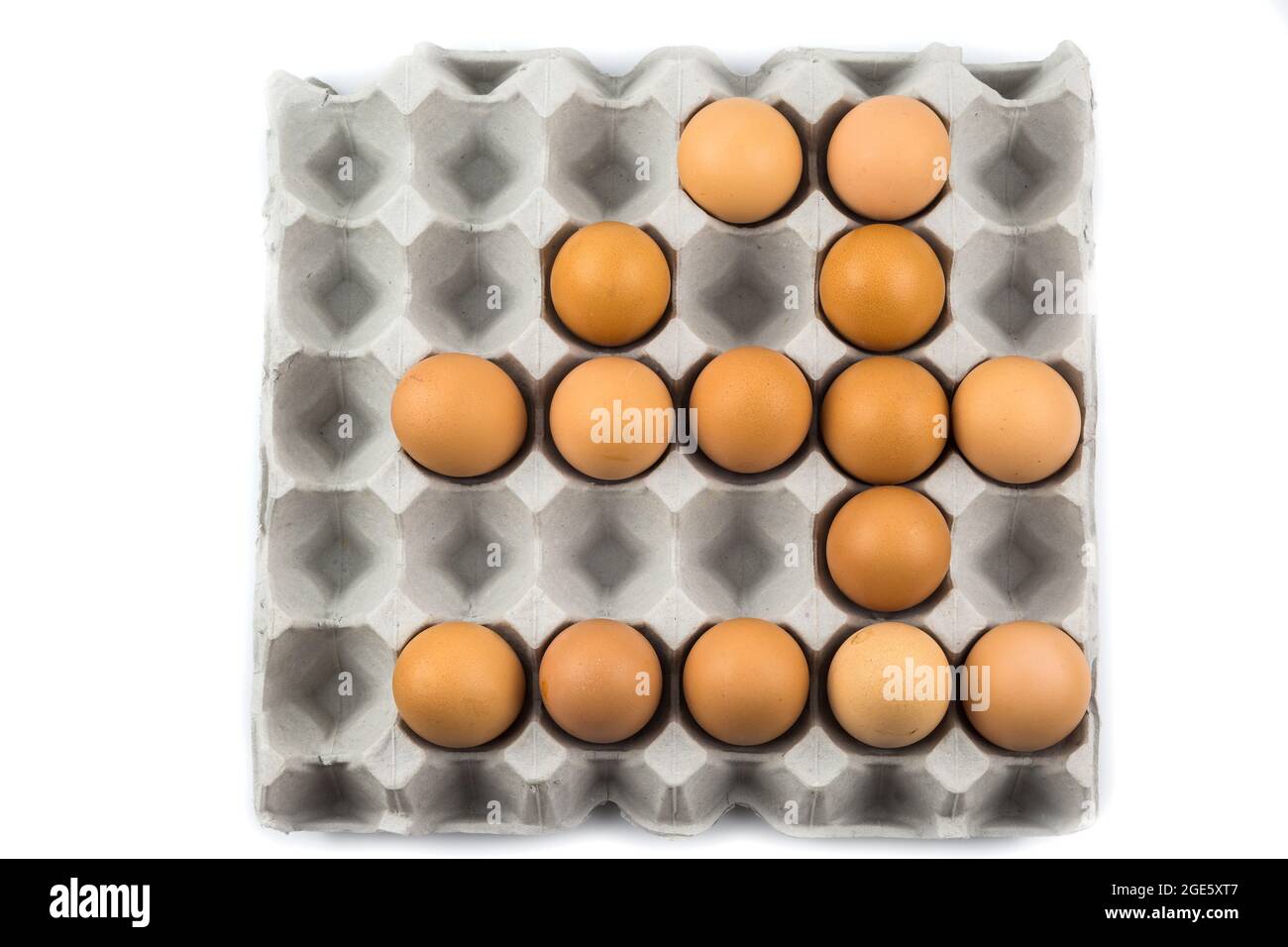 Eggs arranged in a number isolated on white background Stock Photo