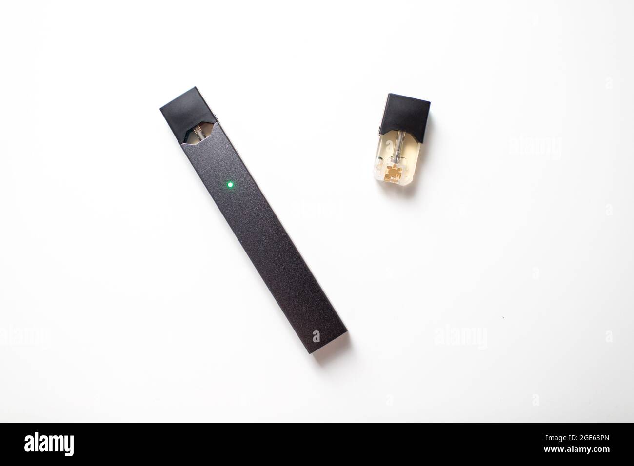MOSCOW - 26 June 2020: Juul e-cigarette nicotine vapor stick and pods. Stock Photo