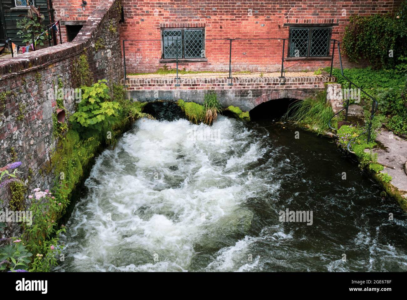 Winchester, United Kingdom, 10th August 2021:- A view of Winchester City Mill on the River Itchen, run by the National Trust Stock Photo