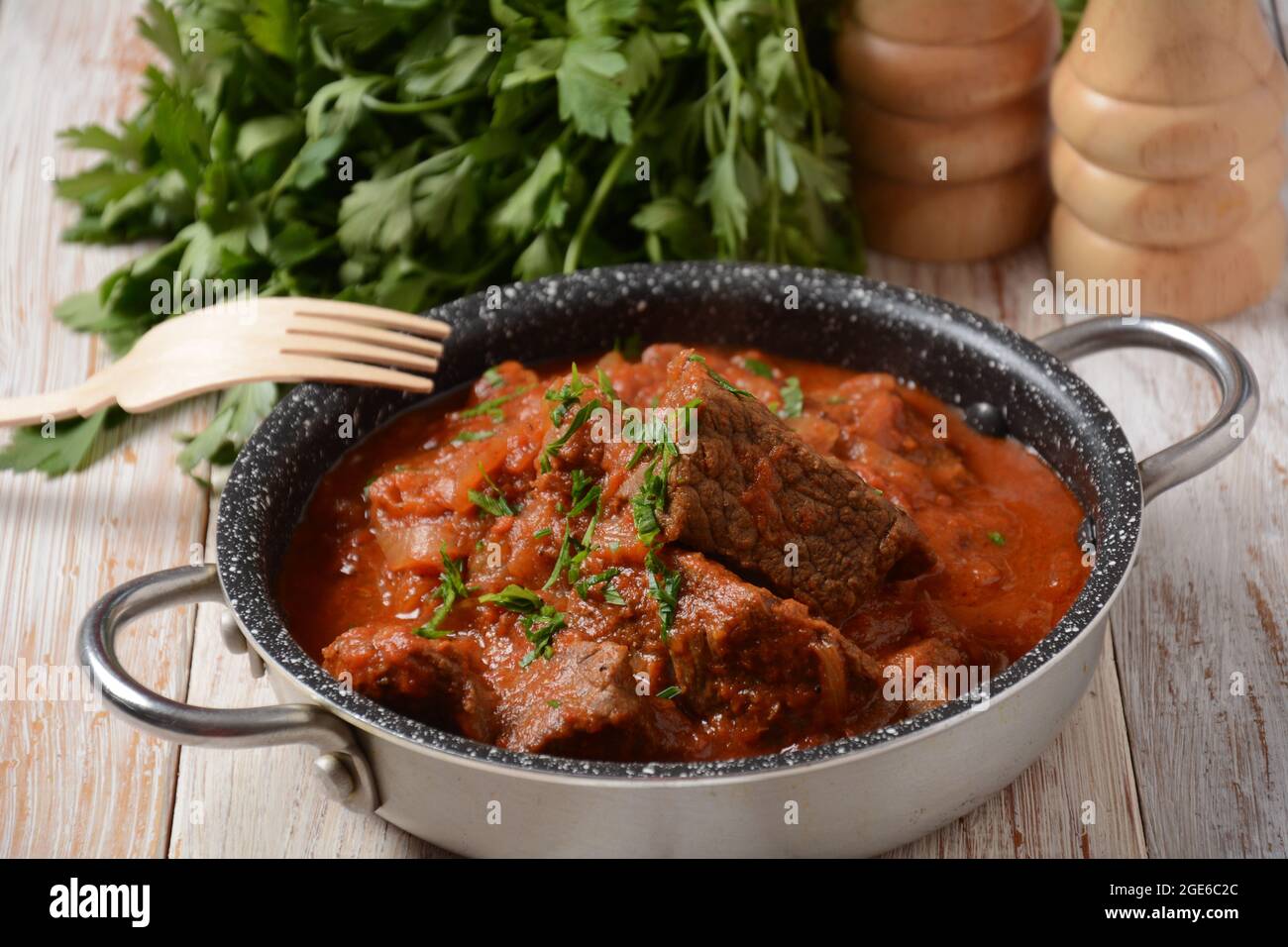 Beef meat stew. Overhead view braised beef meat stew in tomato sauce