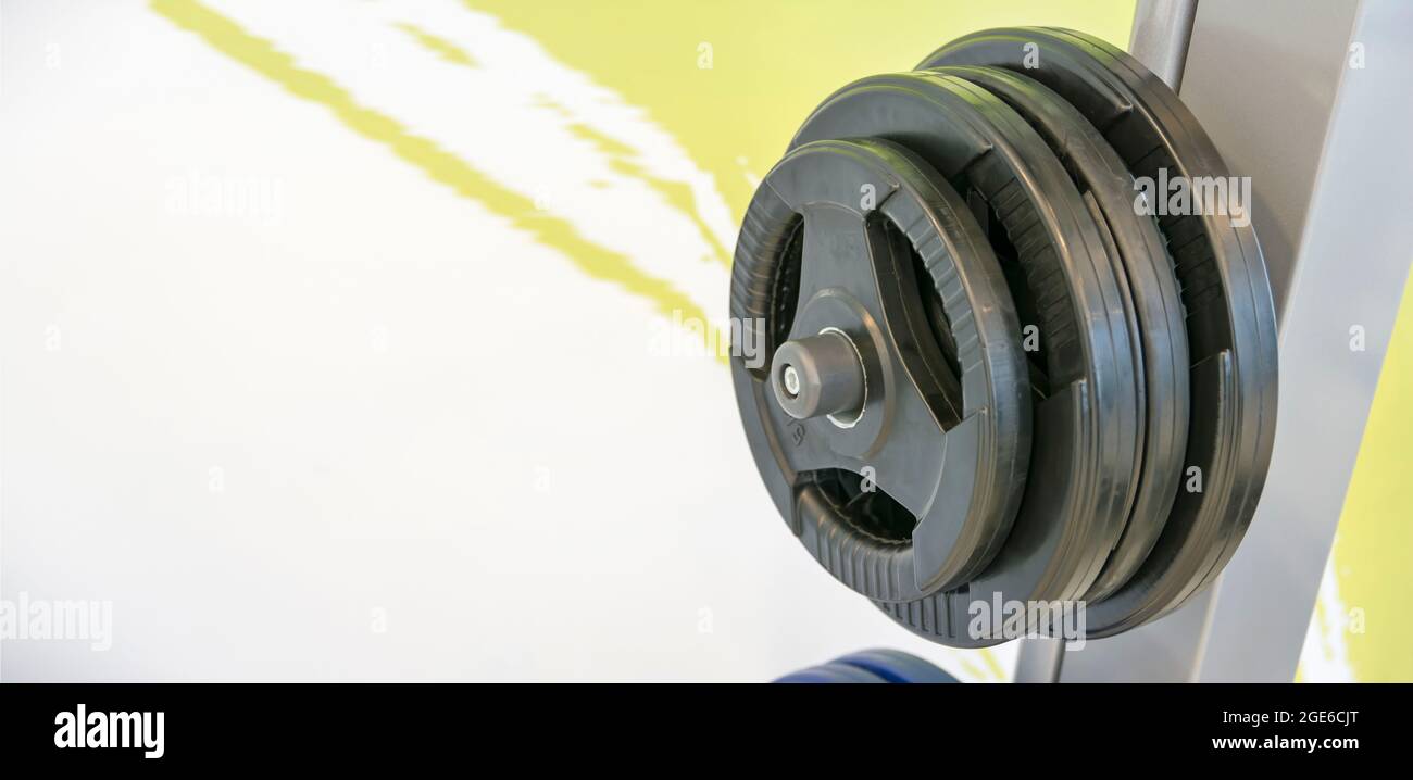 Mounted Plastic Weights For Weightlifting Stock Photo