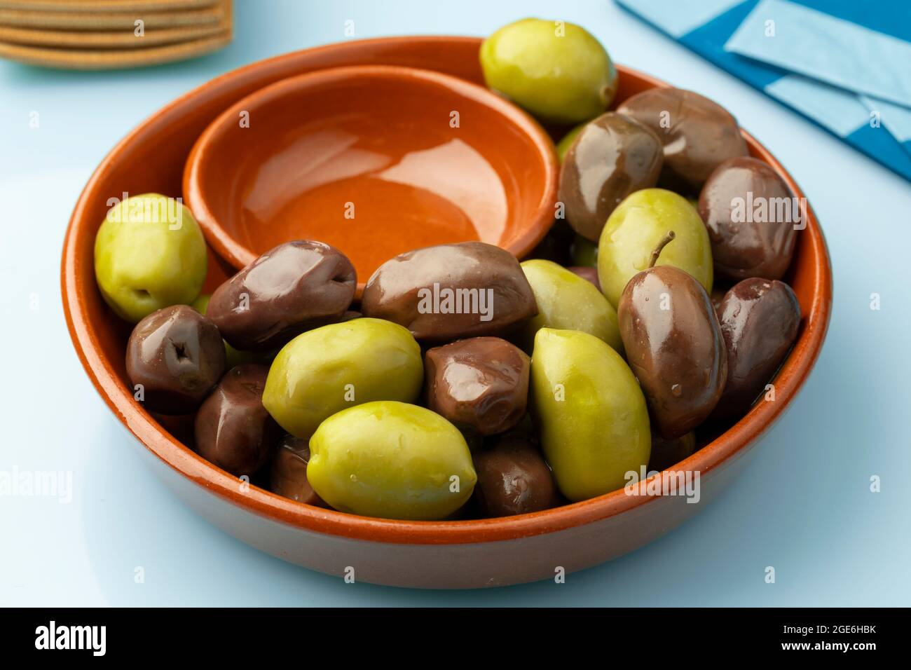 Bowl with Greek green and Kalamata olives close up for a snack Stock Photo