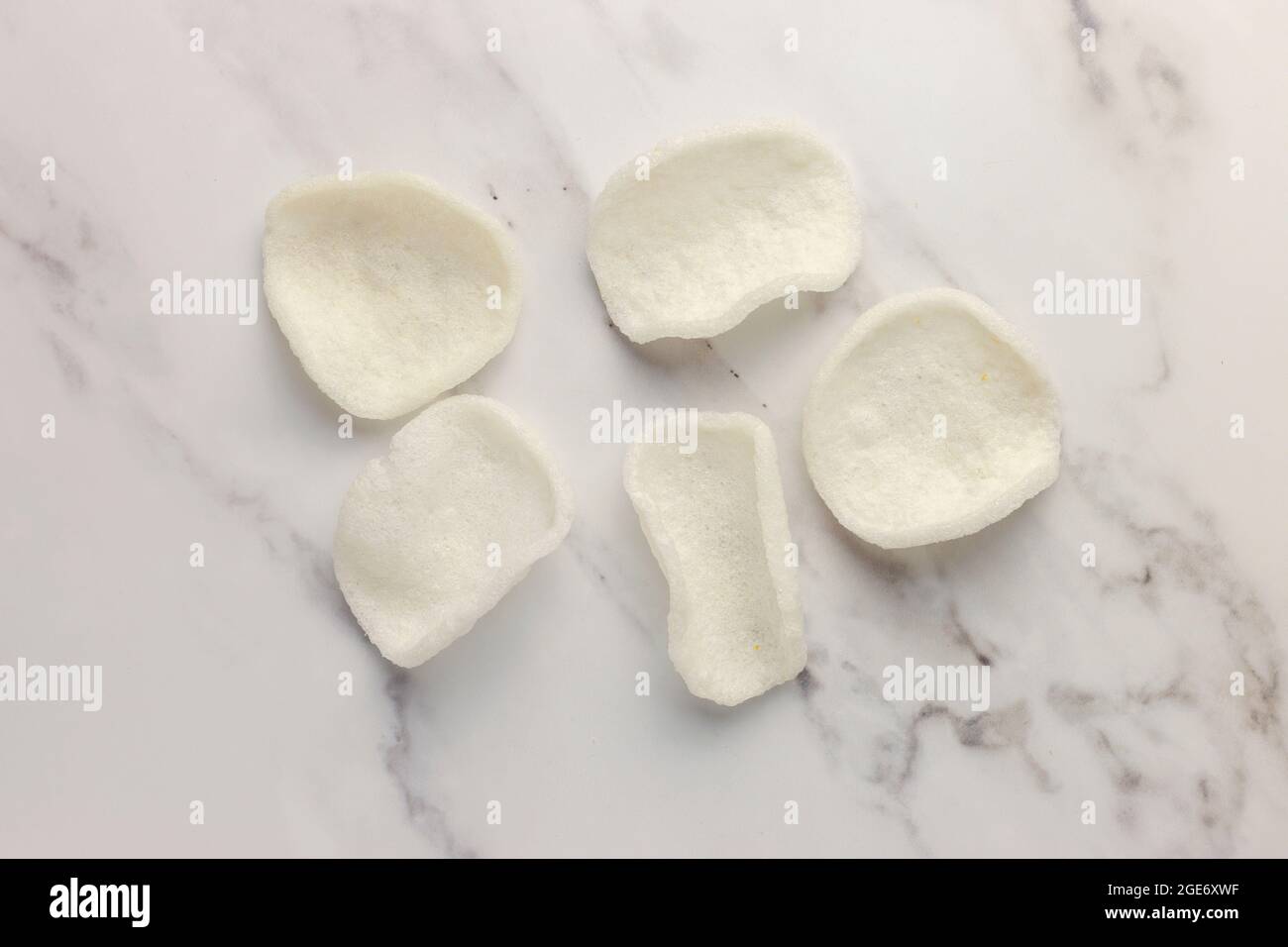 Prawn Crackers on White Marble Background – Isolated, FOODPIX WHITE Stock Photo