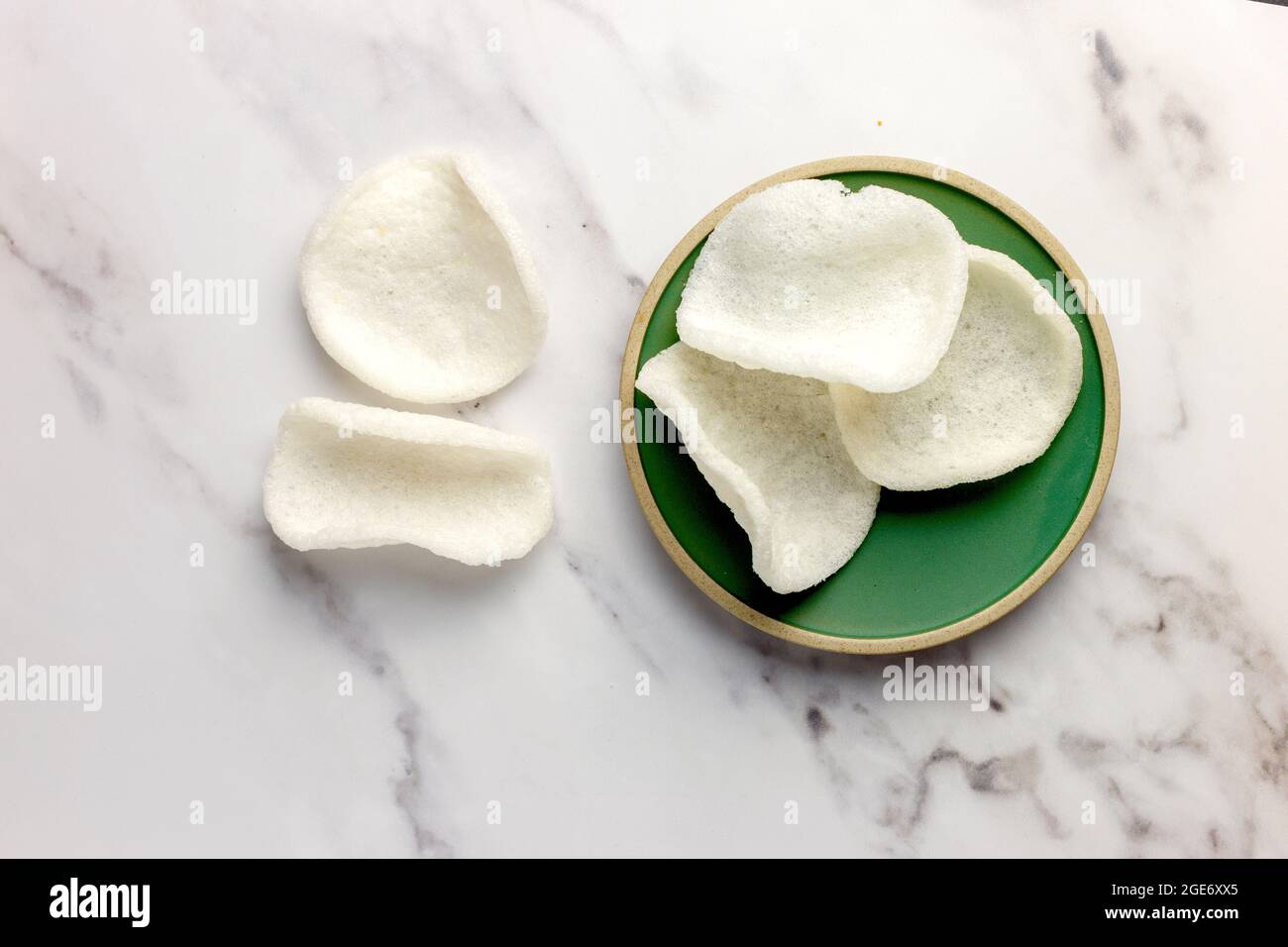 Prawn Crackers on White Marble Background – Isolated, FOODPIX WHITE Stock Photo