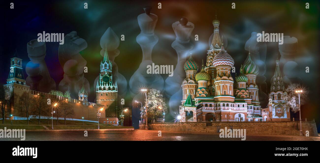 Night illuminated Red Square, Moscow, Russia. St Basil cathedral and Spasskaya tower. Chess pieces in a row at the background. Political games concept Stock Photo