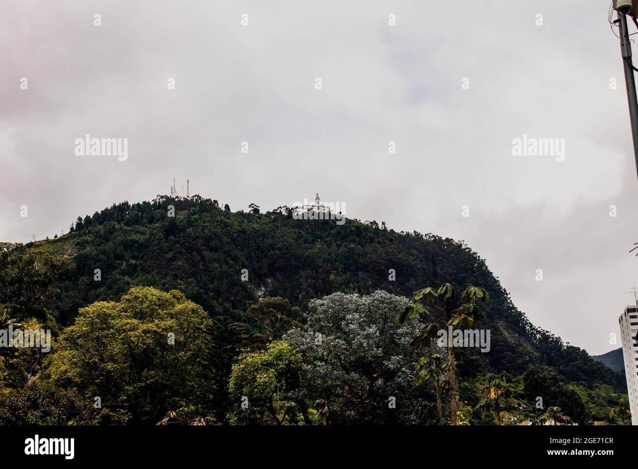 View of the Cerro and the church of Monserrate from the streets of Bogotá, Colombia August 16, 2021 Stock Photo