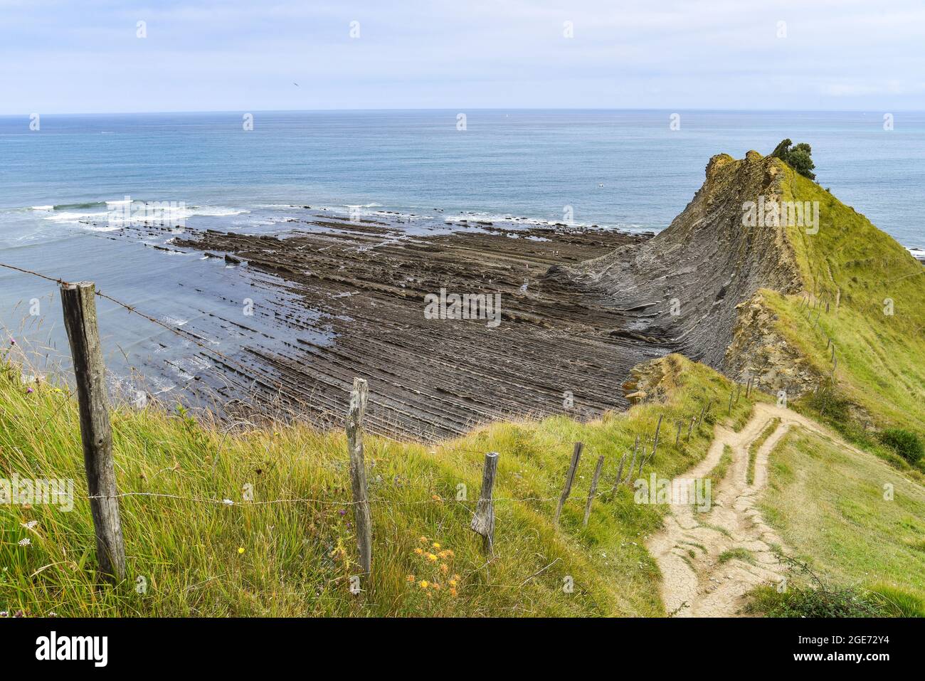 Flysch rock formations in the Basque Coast UNESCO Global Geopark between Zumaia and Deba, Spain Stock Photo